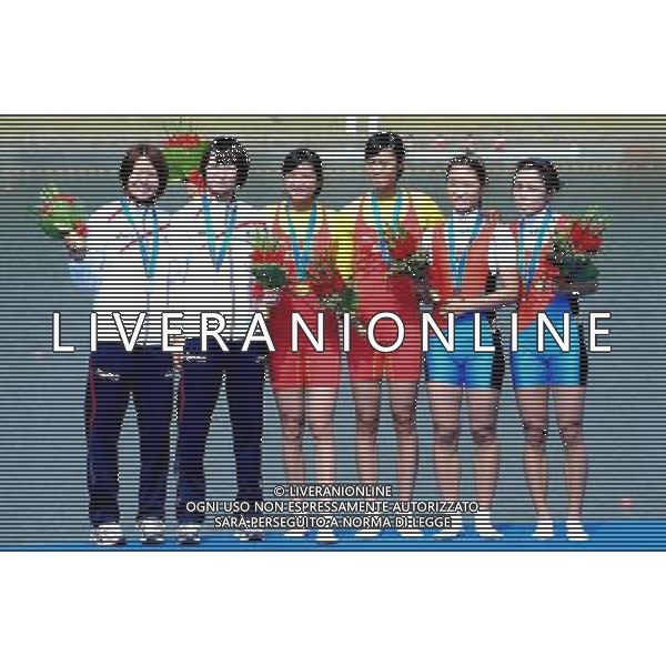 (101118) -- GUANGZHOU, Nov. 18, 2010 () -- Gold medalists Huang Wenyi (R3)/Pan Feihong (L3) of China, silver medalists Akiko Iwamoto (L2)/Atsumi Gukumoto (L) of Japan and bronze medalists Kim Myungshin (R)/Kim Solji of South Korea pose on the podium during the awarding ceremony for the women\'s Lightweight Double Sculls of rowing event at the 16th Asian Games in Guangzhou, south China\'s Guangdong Province, Nov. 18, 2010. (/Wu Xiaoling) ©photoshot/Agenzia Aldo Liverani Sas - ITALY ONLY - CINA: 16mi Giochi Asiatici di Guangzhou