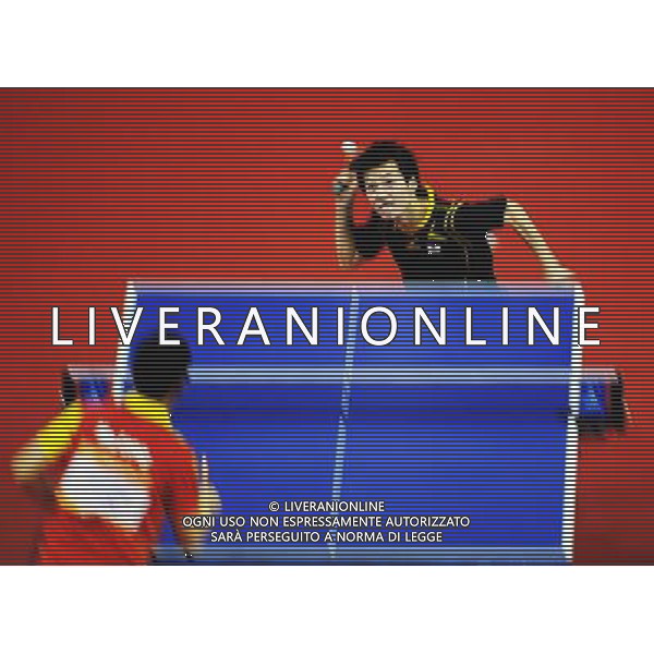 (101118) -- GUANGZHOU, Nov. 18, 2010 () -- Kenta Matsudaira of Japan serves the ball during the men\'s table tennis singles 1/8 final match against China\'s Ma Long at the 16th Asian Games in Guangzhou, south China\'s Guangdong Province, Nov. 18, 2010. Ma Long won the match 4-2. (/Xu Jiajun) ©photoshot/Agenzia Aldo Liverani Sas - ITALY ONLY - CINA: 16mi Giochi Asiatici di Guangzhou