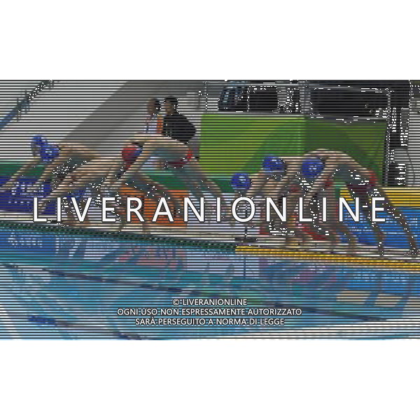 (101118) -- GUANGZHOU, Nov. 18, 2010 () -- The team of Hong Kong of China enter the pool before the men\'s preliminary group A match of water polo at the 16th Asian Games in Guangzhou, south China\'s Guangdong Province, Nov. 18, 2010. The team of Hong Kong lost to the team of South Korea by 5-18. (/Song Zhenping)(sss) ©photoshot/Agenzia Aldo Liverani Sas - ITALY ONLY - CINA: 16mi Giochi Asiatici di Guangzhou