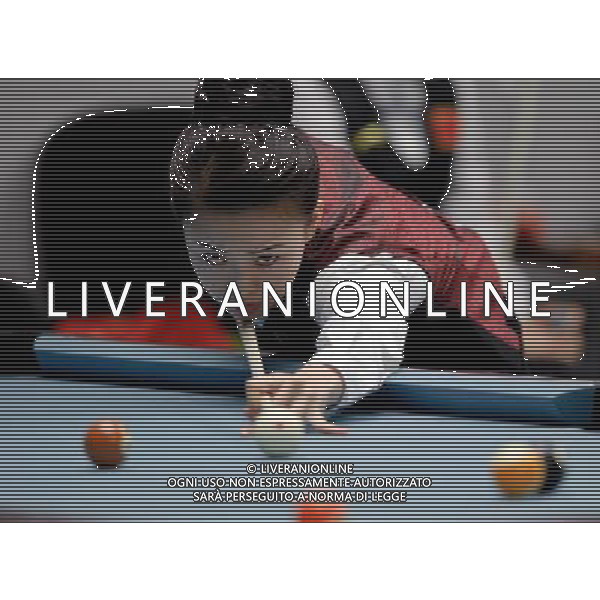 (101118) -- GUANGZHOU, Nov. 18, 2010 () -- Pan Xiaoting of China competes during the quarterfinal of women\'s 9-ball Pool Singles match against Cha You Ran of South Korea at the 16th Asian Games in Guangzhou, south China\'s Guangdong Province, Nov. 18, 2010. Pan Xiaoting won the match 7-6. (/Jiang Kehong)(sss) ©photoshot/Agenzia Aldo Liverani Sas - ITALY ONLY - CINA: 16mi Giochi Asiatici di Guangzhou