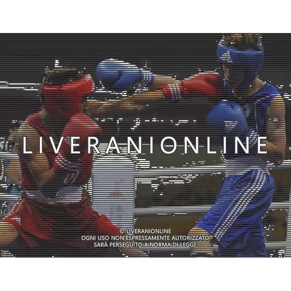 (101118) -- FOSHAN, Nov. 18, 2010 () -- Lin Yu Che (R) of Chinese Taipei vies with Nguyen van Hai of Viet Nam during the men\'s boxing 52kg 1/8 final match at the 16th Asian Games in Foshan, south China\'s Guangdong Province, Nov. 18, 2010. Lin won the match 5-3. (/Gong Lei) ©photoshot/Agenzia Aldo Liverani Sas - ITALY ONLY - CINA: 16mi Giochi Asiatici di Guangzhou