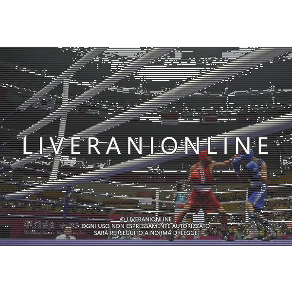 (101118) -- FOSHAN, Nov. 18, 2010 () -- Lin Yu Che (R) of Chinese Taipei vies with Nguyen van Hai of Viet Nam during the men\'s boxing 52kg 1/8 final match at the 16th Asian Games in Foshan, south China\'s Guangdong Province, Nov. 18, 2010. Lin won the match 5-3. (/Gong Lei) ©photoshot/Agenzia Aldo Liverani Sas - ITALY ONLY - CINA: 16mi Giochi Asiatici di Guangzhou
