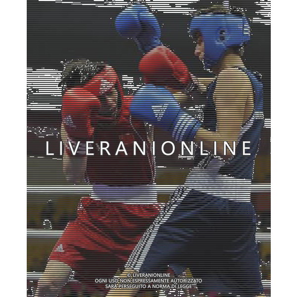 (101118) -- FOSHAN, Nov. 18, 2010 () -- Chang Yong (L) of China vies with Farah Yomudov of Turkmenistan during the men\'s boxing 52kg 1/8 final match at the 16th Asian Games in Foshan, south China\'s Guangdong Province, Nov. 18, 2010. Chang won the match 14-0. (/Gong Lei) ©photoshot/Agenzia Aldo Liverani Sas - ITALY ONLY - CINA: 16mi Giochi Asiatici di Guangzhou