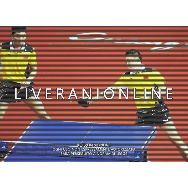 (101118) -- GUANGZHOU, Nov. 18, 2010 () -- China\'s Ma Lin (R)/Xu Xin compete against Al Saadi Mohammed/Nasser Alhajjai Walled of Qatar during men\'s double 1/8 final of table tennis at 16th Asian Games in Guangzhou, south China\'s Guangdong Province, Nov. 18, 2010. Ma Lin/Xu Xin won the match 3-0. (/Xu Jiajun) ©photoshot/Agenzia Aldo Liverani Sas - ITALY ONLY - CINA: 16mi Giochi Asiatici di Guangzhou