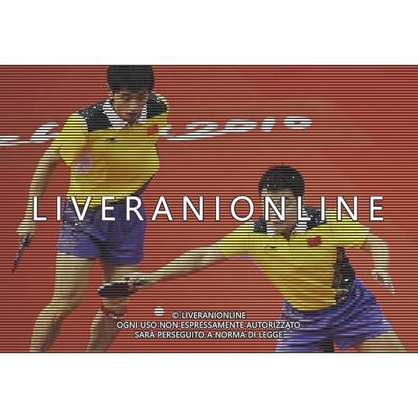 (101118) -- GUANGZHOU, Nov. 18, 2010 () -- China\'s Wang Hao (R)/Zhang Jike compete against Hassan Rashed Mohd/Omar Rashid from United Arab Emirates during men\'s double 1/8 final of table tennis at 16th Asian Games in Guangzhou, south China\'s Guangdong Province, Nov. 18, 2010. Wang Hao/Zhang Jike won the match 3-0. (/Xu Jiajun) ©photoshot/Agenzia Aldo Liverani Sas - ITALY ONLY - CINA: 16mi Giochi Asiatici di Guangzhou