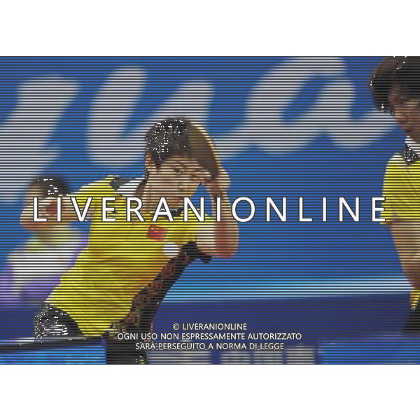 (101118) -- GUANGZHOU, Nov. 18, 2010 () -- China\'s Guo Yue (L)/Li Xiaoxia compete against Lao\'s Sengdavy Phiathep/Thiphakone Southamavong during women\'s double 1/8 final of table tennis at the 16th Asian Games in Guangzhou, south China\'s Guangdong Province, Nov. 18, 2010. Guo Yue/Li Xiaoxia won the match 3-0. (/Xu Jiajun) ©photoshot/Agenzia Aldo Liverani Sas - ITALY ONLY - CINA: 16mi Giochi Asiatici di Guangzhou