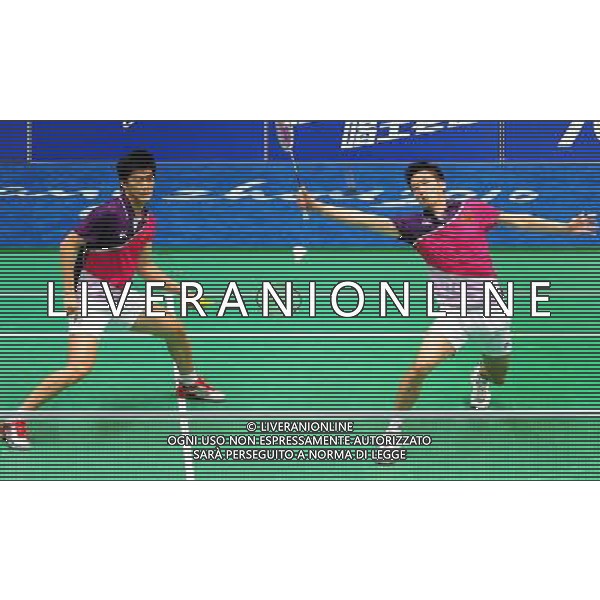 (101118) -- GUANGZHOU, Nov. 18, 2010 () -- China\'s Cai Yun (R)/Fu Haifeng compete against South Korea\'s Chung Jae Sung/Lee Yong Dae during men\'s double quarter-final of badminton at the 16th Asian Games in Guangzhou, south China\'s Guangdong Province, Nov. 18, 2010. Cai Yun/Fu Haifeng lost the match 0-2. (/Lu Hanxin) ©photoshot/Agenzia Aldo Liverani Sas - ITALY ONLY - CINA: 16mi Giochi Asiatici di Guangzhou