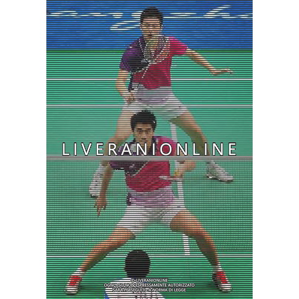 (101118) -- GUANGZHOU, Nov. 18, 2010 () -- China\'s Cai Yun (top)/Fu Haifeng compete against South Korea\'s Chung Jae Sung/Lee Yong Dae during men\'s double quarter-final of badminton at the 16th Asian Games in Guangzhou, south China\'s Guangdong Province, Nov. 18, 2010. Cai Yun/Fu Haifeng lost the match 0-2. (/Lu Hanxin) ©photoshot/Agenzia Aldo Liverani Sas - ITALY ONLY - CINA: 16mi Giochi Asiatici di Guangzhou