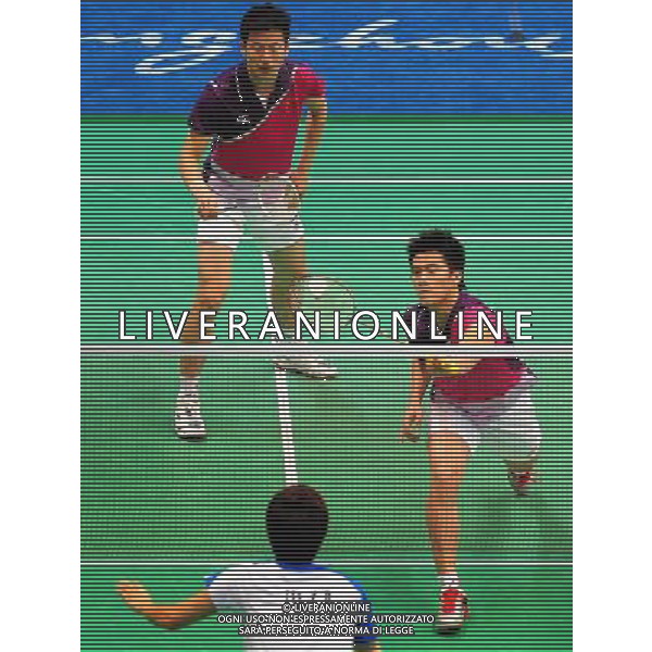 (101118) -- GUANGZHOU, Nov. 18, 2010 () -- China\'s Cai Yun (L)/Fu Haifeng compete against South Korea\'s Chung Jae Sung/Lee Yong Dae during men\'s double quarter-final of badminton at the 16th Asian Games in Guangzhou, south China\'s Guangdong Province, Nov. 18, 2010. Cai Yun/Fu Haifeng lost the match 0-2. (/Lu Hanxin) ©photoshot/Agenzia Aldo Liverani Sas - ITALY ONLY - CINA: 16mi Giochi Asiatici di Guangzhou