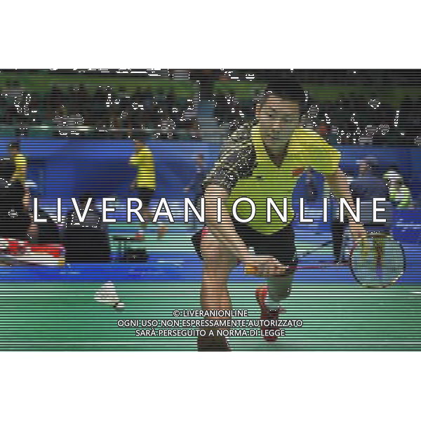 (101118) -- GUANGZHOU, Nov. 18, 2010 () -- China\'s Chen Jin returns the shuttlecock against South Korea\'s Lee Hyun Il during men\'s singles 1/8 final of badminton at the 16th Asian Games in Guangzhou, south China\'s Guangdong Province, Nov. 18, 2010. Chen Jin won the match 2-0. (/Lu Hanxin) ©photoshot/Agenzia Aldo Liverani Sas - ITALY ONLY - CINA: 16mi Giochi Asiatici di Guangzhou