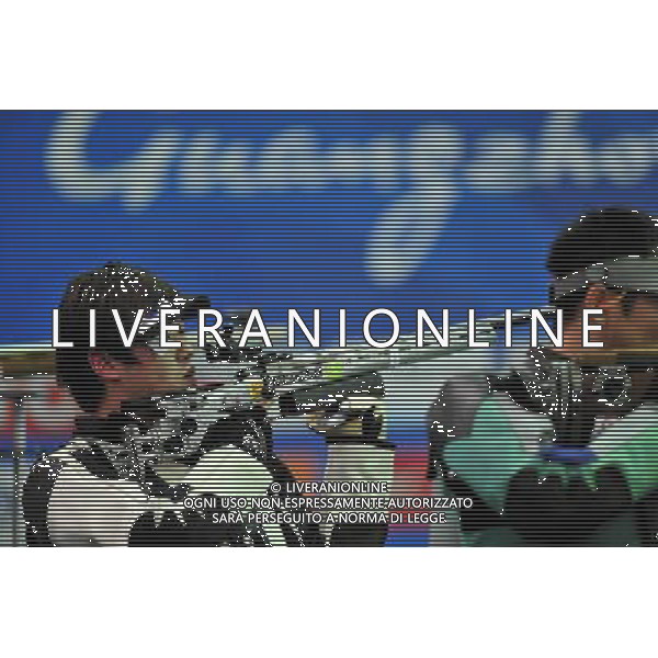 (101118) -- GUANGZHOU, Nov. 18, 2010 () -- South Korea\'s Kim Jong Hyun competes during the men\'s 50m rifle 3 position final of shooting at the 16th Asian Games in Guangzhou, south China\'s Guangdong Province, Nov. 18, 2010. Kim Jonghyun took the second place with 1264.5 shots. (/Chen Yehua) ©photoshot/Agenzia Aldo Liverani Sas - ITALY ONLY - CINA: 16mi Giochi Asiatici di Guangzhou