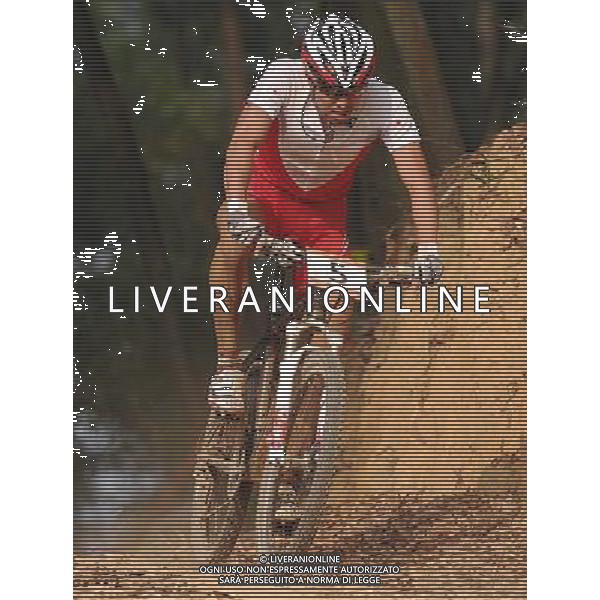 (101118) -- GUANGZHOU, Nov. 18, 2010 () -- Japan\'s Yamamoto Kohei competes during the men\'s cross-country cycling final at the 16th Asian Games near Guangzhou, south China\'s Guangdong Province, Nov. 18, 2010. Yamamoto Kohei took the second place in a time of 2 hours, 11 minutes and 49.14 seconds. (/Li Ga) ©photoshot/Agenzia Aldo Liverani Sas - ITALY ONLY - CINA: 16mi Giochi Asiatici di Guangzhou