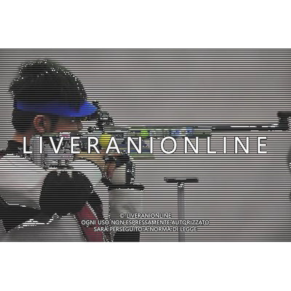 (101118) -- GUANGZHOU, Nov. 18() -- Bronze medalist Zhu Qinan of China competes during the men\'s 50m Rifle 3 Positions match at the 16th Asian Games in Guangzhou, south China\'s Guangdong Province, Nov. 18, 2010. (/Chen Yehua) ©photoshot/Agenzia Aldo Liverani Sas - ITALY ONLY - CINA: 16mi Giochi Asiatici di Guangzhou