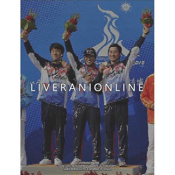 (101118) -- GUANGZHOU, Nov. 18() -- Gold medalists Lee Hyun Tae, Kim Jonghyun and Han Jinseop(left to right) of South Korea pose on the podium during the awarding ceremony for the men\'s 50m Rifle 3 Positions Team Match at the 16th Asian Games in Guangzhou, south China\'s Guangdong Province, Nov. 18, 2010. South Korea won the gold medal with total score of 3489 points.(/Chen Yehua) ©photoshot/Agenzia Aldo Liverani Sas - ITALY ONLY - CINA: 16mi Giochi Asiatici di Guangzhou