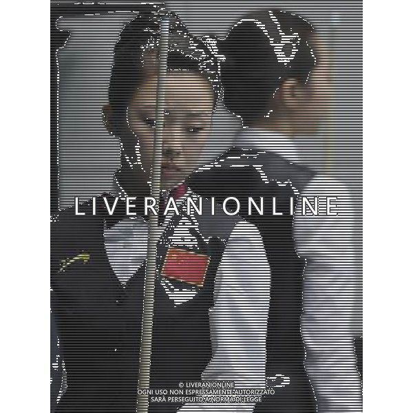 (101118) -- GUANGZHOU, Nov. 18, 2010 () -- China\'s Pan Xiaoting(front) and South Korea\'s Cha You Ram react during their women\'s 9-ball pool singles quarterfinals match of billiard at the 16th Asian Games in Guangzhou, capital of south China\'s Guangdong Province, Nov. 18, 2010. Pan won the match 7-6 to enter the semifinals of the event. (/Yang Lei) ©photoshot/Agenzia Aldo Liverani Sas - ITALY ONLY - CINA: 16mi Giochi Asiatici di Guangzhou