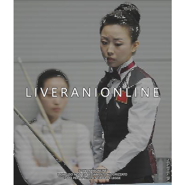 (101118) -- GUANGZHOU, Nov. 18, 2010 () -- China\'s Pan Xiaoting (front) reacts in the women\'s 9-ball pool singles quarterfinals match of billiard against South Korea\'s Cha You Ram at the 16th Asian Games in Guangzhou, capital of south China\'s Guangdong Province, Nov. 18, 2010. Pan won the match 7-6 and entered the semifinals of the event. (/Yang Zongyou) ©photoshot/Agenzia Aldo Liverani Sas - ITALY ONLY - CINA: 16mi Giochi Asiatici di Guangzhou