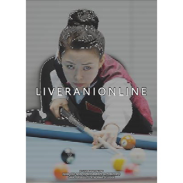 (101118) -- GUANGZHOU, Nov. 18, 2010 () -- China\'s Pan Xiaoting hits the ball during the women\'s 9-ball pool singles quarterfinals match of billiard against South Korea\'s Cha You Ram at the 16th Asian Games in Guangzhou, capital of south China\'s Guangdong Province, Nov. 18, 2010. Pan won the match 7-6 and entered the semifinals of the event. (/Yang Zongyou) ©photoshot/Agenzia Aldo Liverani Sas - ITALY ONLY - CINA: 16mi Giochi Asiatici di Guangzhou