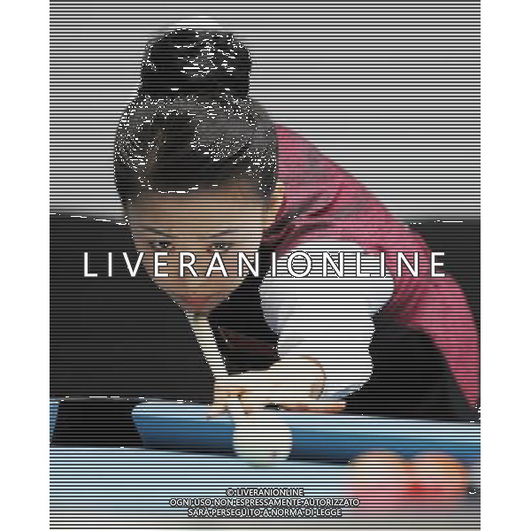 (101118) -- GUANGZHOU, Nov. 18, 2010 () -- China\'s Pan Xiaoting hits the ball during the women\'s 9-ball pool singles quarterfinals match of billiard against South Korea\'s Cha You Ram at the 16th Asian Games in Guangzhou, capital of south China\'s Guangdong Province, Nov. 18, 2010. Pan won the match 7-6 and entered the semifinals of the event. (/Yang Zongyou) ©photoshot/Agenzia Aldo Liverani Sas - ITALY ONLY - CINA: 16mi Giochi Asiatici di Guangzhou