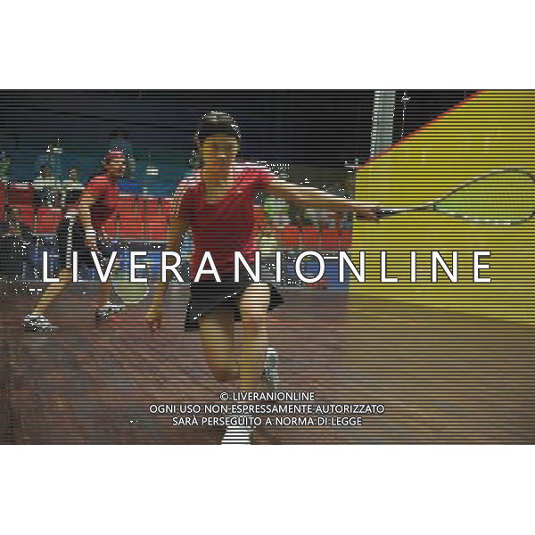 (101118) -- GUANGZHOU, Nov. 18, 2010 () -- Chan Ho Ling (front) of Hong Kong of China competes during the women\'s individual round 1 match of squash against Saima Shoukat of Pakistan at the 16th Asian Games in Guangzhou, capital of south China\'s Guangdong Province, Nov. 18, 2010. Chan Ho Lin won the match 3-0. (/Wang Lei) ©photoshot/Agenzia Aldo Liverani Sas - ITALY ONLY - CINA: 16mi Giochi Asiatici di Guangzhou