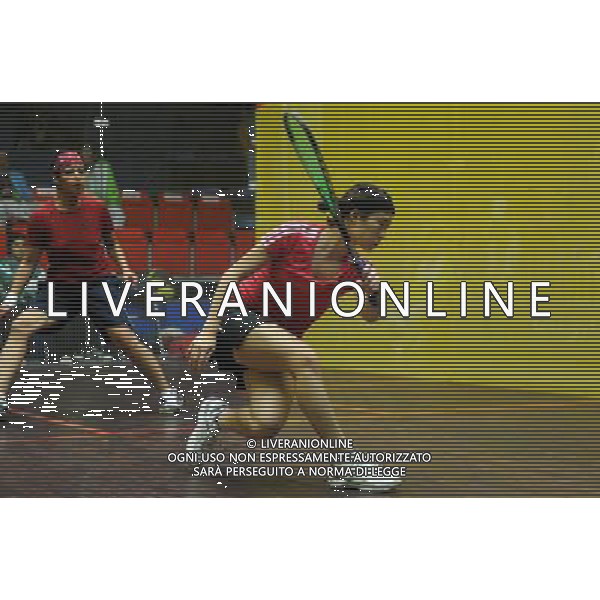 (101118) -- GUANGZHOU, Nov. 18, 2010 () -- Chan Ho Ling (front) of Hong Kong of China competes during the women\'s individual round 1 match of squash against Saima Shoukat of Pakistan at the 16th Asian Games in Guangzhou, capital of south China\'s Guangdong Province, Nov. 18, 2010. Chan Ho Lin won the match 3-0. (/Wang Lei) ©photoshot/Agenzia Aldo Liverani Sas - ITALY ONLY - CINA: 16mi Giochi Asiatici di Guangzhou
