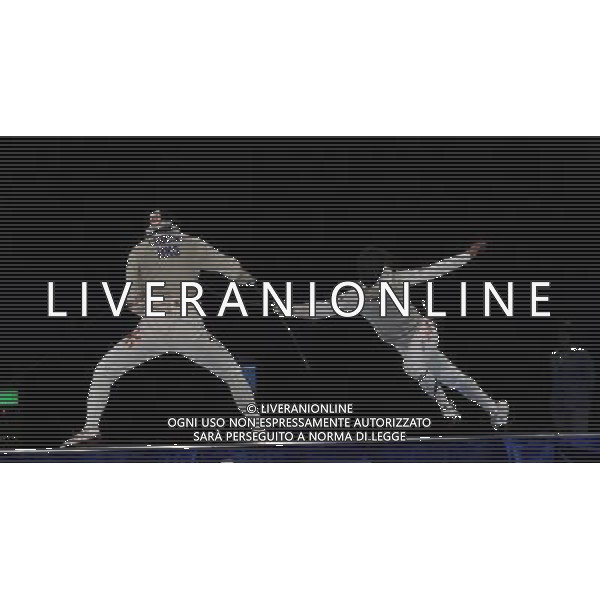 (101120) -- GUANGZHOU, Nov. 20, 2010 () -- South Korea\'s Choi Byung Chul (R) competes with Cheung Siu Lun of Hong Kong of China during the men\'s individual foil final of fencing at the 16th Asian Games in Guangzhou, south China\'s Guangdong Province, Nov. 20, 2010. Choi Byung Chul won the match 15-14 to claim the title of the event. (/Yang Lei) ©photoshot/Agenzia Aldo Liverani Sas - ITALY ONLY - CINA: 16mi Giochi Asiatici