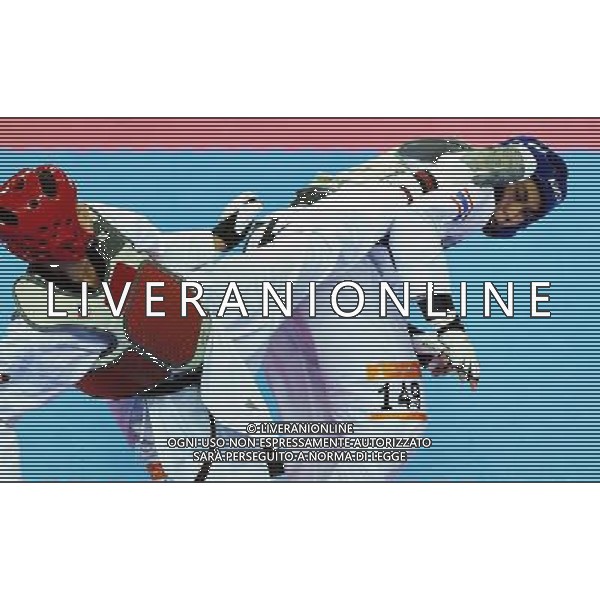 (101120) -- GUANGZHOU, Nov. 20, 2010 () -- Pen-Ek Karaket(R) of Thailand fights against Wei Chen Yang of Chinese Taipei during the final of men\'s under 58kg of taekwondo at the 16th Asian Games in Guangzhou, south China\'s Guangdong Province, Nov. 20, 2010. Wei claimed the title. (/Guo Dayue)(wll) ©photoshot/Agenzia Aldo Liverani Sas - ITALY ONLY - CINA: 16mi Giochi Asiatici