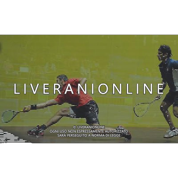 (101120) -- GUANGZHOU, Nov. 20, 2010 () -- Azlan Mohamad Iskandar (L) of Malaysia competes during the men\'s individual Squash semifinals against Saurav Ghosal of India at the 16th Asian Games in Guangzhou, south China\'s Guangdong Province, Nov. 20, 2010. Azlan Mohamad Iskandar won the match by 3-1 and entered the final. (/Wang Lei) ©photoshot/Agenzia Aldo Liverani Sas - ITALY ONLY - CINA: 16mi Giochi Asiatici