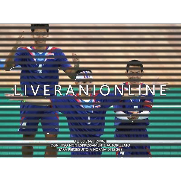 (101120) -- GUANGZHOU, Nov. 20, 2010 () -- Players of Thailand celebrate the scoring during the Sepaktakraw men\'s team final against Malaysia at the 16th Asian Games in Guangzhou, south China\'s Guangdong Province, Nov. 20, 2010. Thailand won the final by 2-0 and get the gold medal. (/Yan Yan) ©photoshot/Agenzia Aldo Liverani Sas - ITALY ONLY - CINA: 16mi Giochi Asiatici