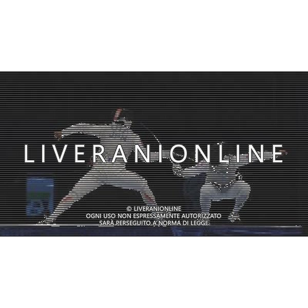 (101120) -- GUANGZHOU, Nov. 20, 2010 () -- South Korea\'s Choi Byung Chui(R) competes with Japan\'s Ota Yuki during the men\'s individual foil semifinal match of Fencing at the 16th Asian Games in Guangzhou, south China\'s Guangdong Province, Nov. 20, 2010. Choi Byung Chui won 15-12 and entered the final of the event. (/Yang Lei) ©photoshot/Agenzia Aldo Liverani Sas - ITALY ONLY - CINA: 16mi Giochi Asiatici