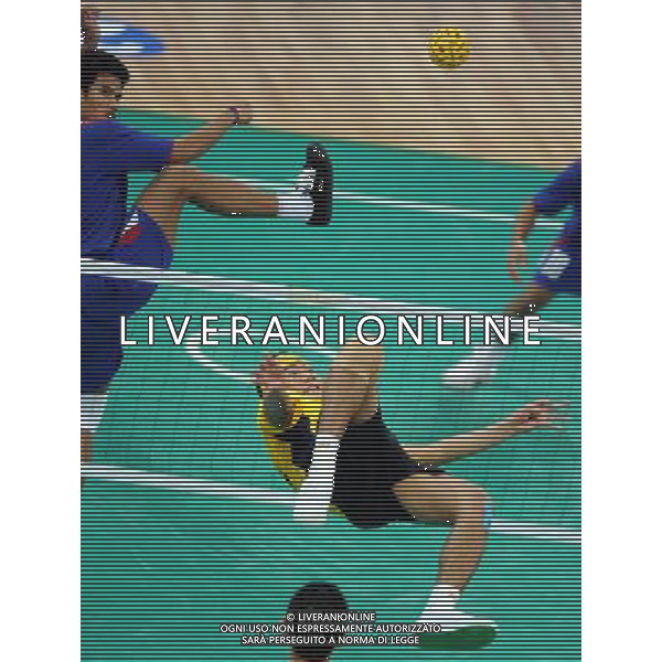 (101120) -- GUANGZHOU, Nov. 20, 2010 () -- Norshahruddin Mad Ghani (Bottom) of Malaysia competes during the Sepaktakraw men\'s team final against Thailand at the 16th Asian Games in Guangzhou, south China\'s Guangdong Province, Nov. 20, 2010. Malaysia lost the final by 0-2 and get the silver medal. (/Yan Yan) ©photoshot/Agenzia Aldo Liverani Sas - ITALY ONLY - CINA: 16mi Giochi Asiatici