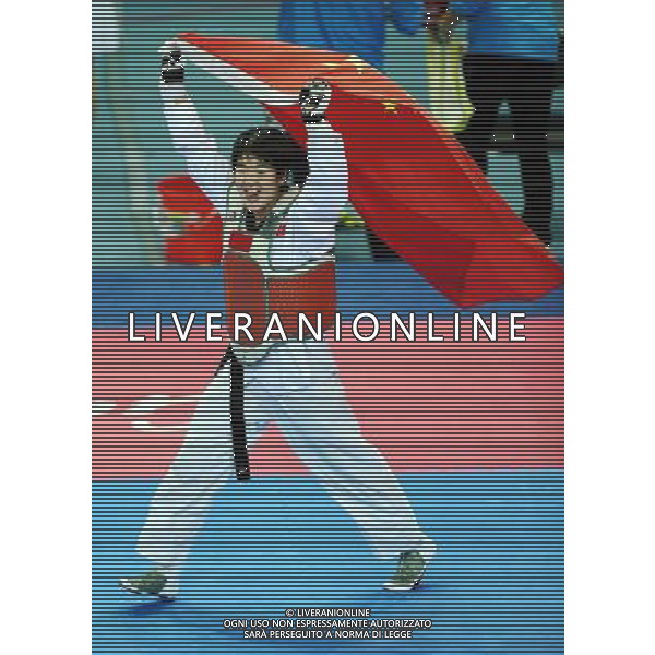 (101120) -- GUANGZHOU, Nov. 20, 2010 () -- Liu Rui of China celebrates after winning the final of women\'s over 73kg of taekwondo against Oh Jung Ah of South Korea at the 16th Asian Games in Guangzhou, south China\'s Guangdong Province, Nov. 20, 2010. Liu claimed the title with 4-3. (/Guo Dayue)(wll) ©photoshot/Agenzia Aldo Liverani Sas - ITALY ONLY - CINA: 16mi Giochi Asiatici