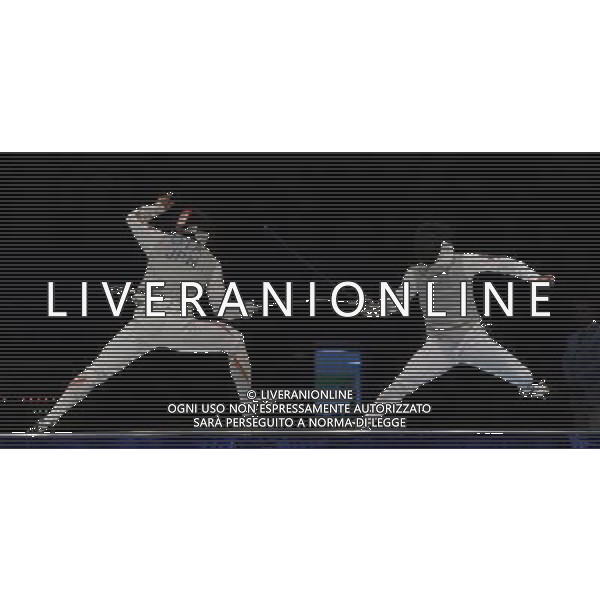 (101120) -- GUANGZHOU, Nov. 20, 2010 () -- South Korea\'s Choi Byung Chui(R) competes with Japan\'s Ota Yuki during their men\'s individual foil semifinal match of Fencing at the 16th Asian Games in Guangzhou, south China\'s Guangdong Province, Nov. 20, 2010. Choi Byung Chui won 15-12 to enther the final of the event. (/Yang Lei) ©photoshot/Agenzia Aldo Liverani Sas - ITALY ONLY - CINA: 16mi Giochi Asiatici