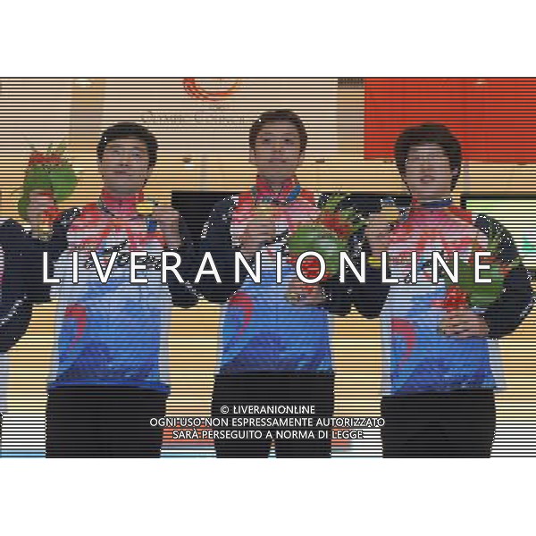 (101120) -- GUANGZHOU, Nov. 20, 2010 () -- Gold medalists Choi Bok Eum (R)/Choi Yong Kyu (L)/Jang Dong Chul pose during the awarding ceremony of the men\'s trios of bowling competition at the 16th Asian Games in Guangzhou, south China\'s Guangdong Province, Nov. 20, 2010. (/Li Gang) ©photoshot/Agenzia Aldo Liverani Sas - ITALY ONLY - CINA: 16mi Giochi Asiatici