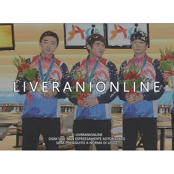 (101120) -- GUANGZHOU, Nov. 20, 2010 () -- Silver medalists Hong Hae Sol (L)/Cho Young Seon (C)/Suh Sang Cheon of South Korea pose during the awarding ceremony of the men\'s trios of bowling competition at the 16th Asian Games in Guangzhou, south China\'s Guangdong Province, Nov. 20, 2010. (/Li Gang) ©photoshot/Agenzia Aldo Liverani Sas - ITALY ONLY - CINA: 16mi Giochi Asiatici