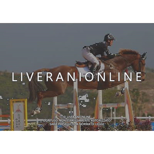 (101120) -- GUANGZHOU, Nov. 20, 2010 () -- South Korea\'s Cheon Jai Sik competes with his horse Thomas O\'Mally2 during the Eventing Team Qualifier Jumping of Equestrian competition at the 16th Asian Games in Guangzhou, south China\'s Guangdong Province, Nov. 20, 2010. South Korea got the fifth place of Eventing Team with 167.20 points in total result. (/Xiang Mei) ©photoshot/Agenzia Aldo Liverani Sas - ITALY ONLY - CINA: 16mi Giochi Asiatici
