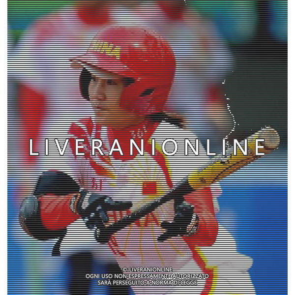 (101120) -- GUANGZHOU, Nov. 20, 2010 () -- Zhou Yi of China competes during the women\'s preliminary of softball competition against Thailand at the 16th Asian Games in Guangzhou, south China\'s Guangdong Province, Nov. 20, 2010. China won 9-0. (/Wu Xiaoling) ©photoshot/Agenzia Aldo Liverani Sas - ITALY ONLY - CINA: 16mi Giochi Asiatici
