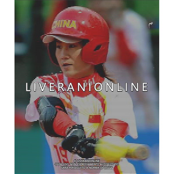 (101120) -- GUANGZHOU, Nov. 20, 2010 () -- Zhou Yi of China competes during the women\'s preliminary of softball competition against Thailand at the 16th Asian Games in Guangzhou, south China\'s Guangdong Province, Nov. 20, 2010. China won 9-0. (/Wu Xiaoling) ©photoshot/Agenzia Aldo Liverani Sas - ITALY ONLY - CINA: 16mi Giochi Asiatici