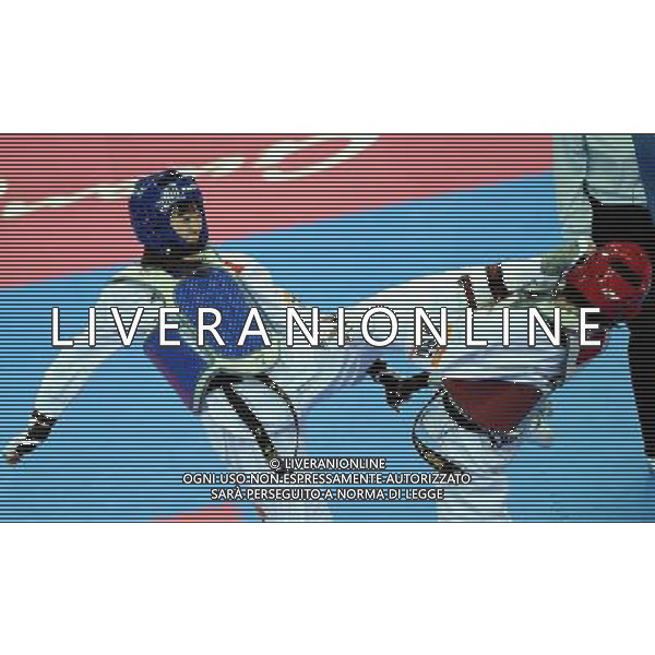 (101120) -- GUANGZHOU, Nov. 20, 2010 () -- Luo Wei(L) of China fights against Feruza Yergeshova of Kazakhstan during their final of women\'s under 73kg of taekwondo at the 16th Asian Games in Guangzhou, south China\'s Guangdong Province, Nov. 20, 2010. Luo wei claimed the title with 5-4. (/Guo Dayue)(wll) ©photoshot/Agenzia Aldo Liverani Sas - ITALY ONLY - CINA: 16mi Giochi Asiatici