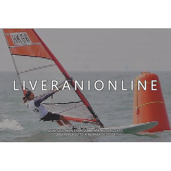 (101120) -- SHANWEI, Nov. 20, 2010 () -- Chan Hei Man Hayley of Hong Kong of China competes during the women\'s RS:X race of sailing competition at the 16th Asian Games in Shanwei, south China\'s Guangdong Province, Nov. 20, 2010. Chan ranked 2nd after 12 rounds. (/Zhu Zheng) ©photoshot/Agenzia Aldo Liverani Sas - ITALY ONLY - CINA: 16mi Giochi Asiatici
