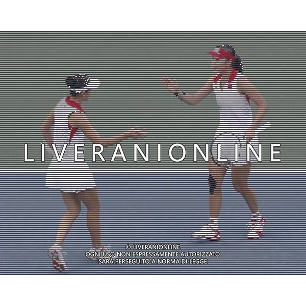 (101120) -- GUANGZHOU, Nov. 20, 2010 () -- Peng Shuai (R) of China celebrates with her partner Yan Zi during the women\'s doubles quarterfinal of tennis event against Akqui Amanmuradova and Albina Khabibulina of Uzbekistan at the 16th Asian Games in Guangzhou, south China\'s Guangdong Province, Nov. 20, 2010. Peng and Yan advanced to the semifinal with 2-0. (/Chen Jianli)(wll) ©photoshot/Agenzia Aldo Liverani Sas - ITALY ONLY - CINA: 16mi Giochi Asiatici