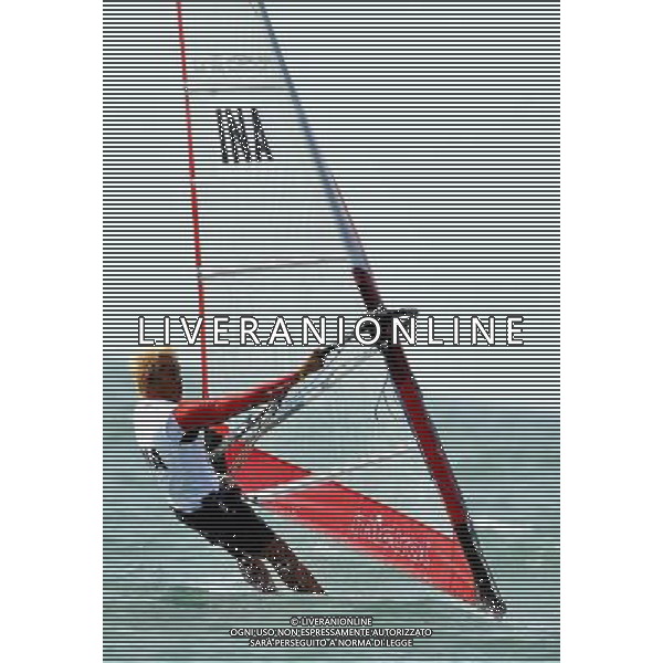 (101120) -- SHANWEI, Nov. 20, 2010 () -- Gusti Made Oka Sulaksana of Indonesia competes during the men\'s Mistral race of sailing competition at the 16th Asian Games in Shanwei, south China\'s Guangdong Province, Nov. 20, 2010. Gusti Made Oka Sulaksana ranked 2nd after 12 rounds. (/Zhu Zheng) ©photoshot/Agenzia Aldo Liverani Sas - ITALY ONLY - CINA: 16mi Giochi Asiatici