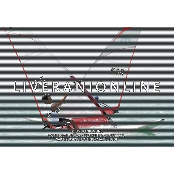 (101120) -- SHANWEI, Nov. 20, 2010 () -- Chan King Yin (L) of Hong Kong of China competes during the men\'s Mistral race of sailing competition at the 16th Asian Games in Shanwei, south China\'s Guangdong Province, Nov. 20, 2010. Chan ranked 1st after 12 rounds. (/Zhu Zheng) ©photoshot/Agenzia Aldo Liverani Sas - ITALY ONLY - CINA: 16mi Giochi Asiatici