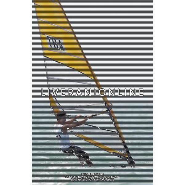 (101120) -- SHANWEI, Nov. 20, 2010 () -- Ek Boonsawad of Thailand competes during the men\'s RS:X race of sailing competition at the 16th Asian Games in Shanwei, south China\'s Guangdong Province, Nov. 20, 2010. Ek Boonsawad ranked 2nd after 12 rounds. (/Zhu Zheng) ©photoshot/Agenzia Aldo Liverani Sas - ITALY ONLY - CINA: 16mi Giochi Asiatici