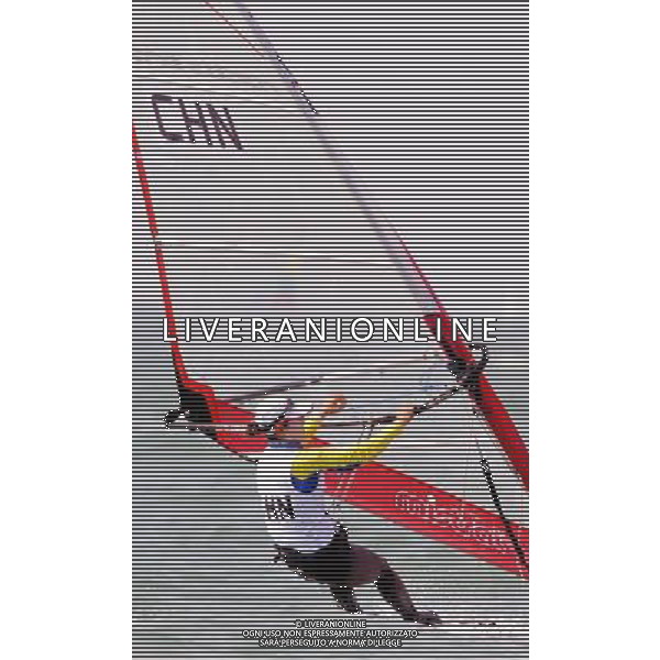(101120) -- SHANWEI, Nov. 20, 2010 () -- Wang Ning of China competes during the women\'s Mistral race of sailing competition at the 16th Asian Games in Shanwei, south China\'s Guangdong Province, Nov. 20, 2010. Wang ranked 1st after 12 rounds. (/Zhu Zheng) ©photoshot/Agenzia Aldo Liverani Sas - ITALY ONLY - CINA: 16mi Giochi Asiatici