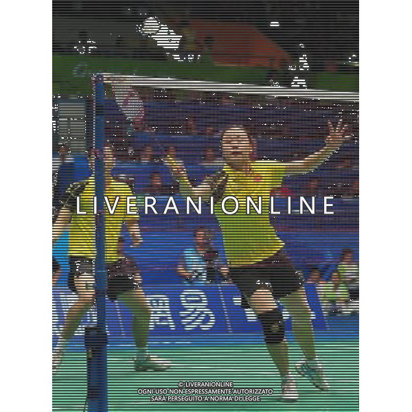 (101120) -- GUANGZHOU, Nov. 20, 2010 () -- Zhang Nan/Zhao Yunlei (R) of China compete during the mixed doubles semifinal of badminton event against Chen Hung Ling/Cheng Wen Hsing of Chinese Taipei at the 16th Asian Games in Guangzhou, south China\'s Guangdong Province, Nov. 20, 2010. Zhang and Zhao won the match 2-0. (/Lu Hanxin) ©photoshot/Agenzia Aldo Liverani Sas - ITALY ONLY - CINA: 16mi Giochi Asiatici