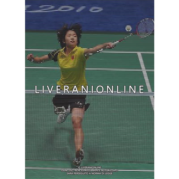 (101120) -- GUANGZHOU, Nov. 20, 2010 () -- Wang Xin of China returns the shuttle during the women\'s badminton final against compatriot Wang Shixian at the 16th Asian Games in Guangzhou, south China\'s Guangdong Province, Nov. 20, 2010. Wang Xin lost the match 0-2 and took the silver. (/Song Zhenping) ©photoshot/Agenzia Aldo Liverani Sas - ITALY ONLY - CINA: 16mi Giochi Asiatici