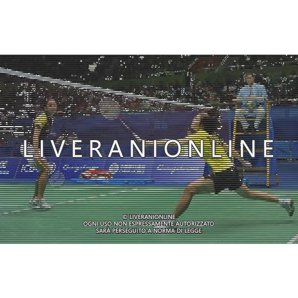 (101120) -- GUANGZHOU, Nov. 20, 2010 () -- Wang Xin (R) of China returns the shuttle during the women\'s badminton final against compatriot Wang Shixian at the 16th Asian Games in Guangzhou, south China\'s Guangdong Province, Nov. 20, 2010. Wang Xin lost the match 0-2 and took the silver. (/Lu Hanxin) ©photoshot/Agenzia Aldo Liverani Sas - ITALY ONLY - CINA: 16mi Giochi Asiatici