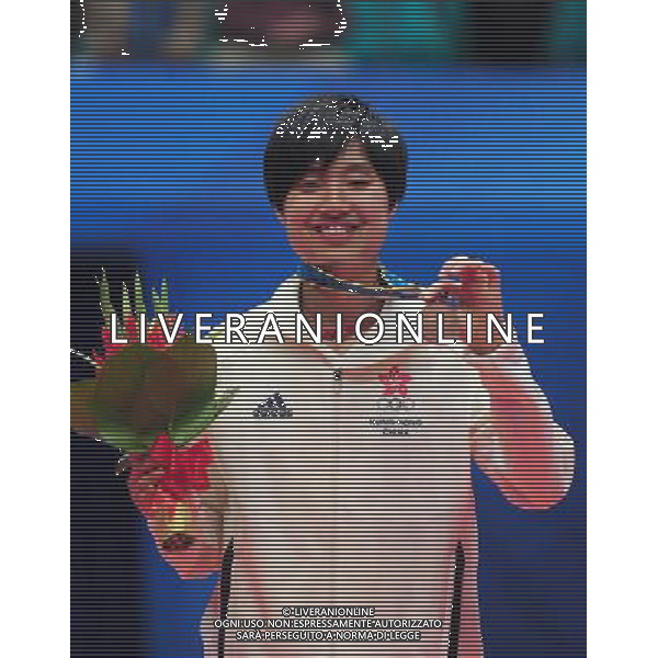 (101120) -- GUANGZHOU, Nov. 20, 2010 () -- Bronze medalists Yip Pui Yin of Hong Kong of China poses during the awarding ceremony for the women\'s singles of badminton at the 16th Asian Games in Guangzhou, south China\'s Guangdong Province, Nov. 20, 2010. (/Lu Hanxin) ©photoshot/Agenzia Aldo Liverani Sas - ITALY ONLY - CINA: 16mi Giochi Asiatici