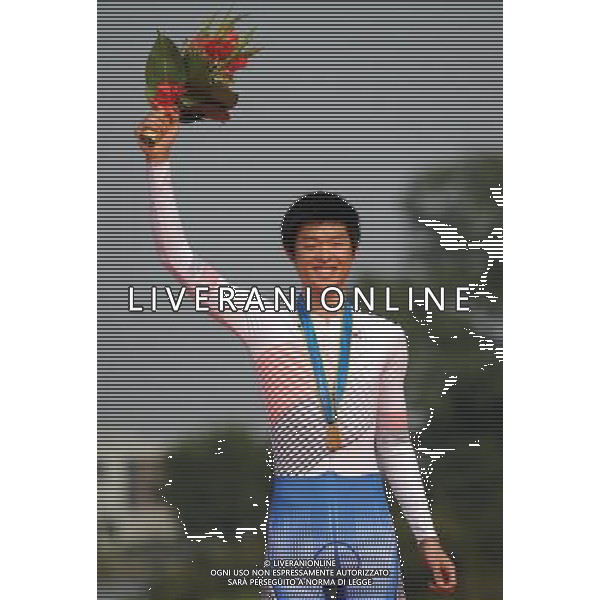 (101120) -- GUANGZHOU, Nov. 20, 2010 () -- Lee Min Hye of South Korea reacts during the awarding ceremony of the women\'s individual time trial of cycling road at the 16th Asian Games in Guangzhou, south China\'s Guangdong Province, Nov. 20, 2010. Lee Min Hye won the gold with 49 minutes 38.35 seconds. (/Li Ga) ©photoshot/Agenzia Aldo Liverani Sas - ITALY ONLY - CINA: 16mi Giochi Asiatici
