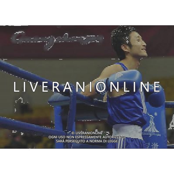 (101120) -- FOSHAN, Nov. 20, 2010 () -- Zou Shiming of China reacts before the men\'s 46-49 kg match of boxing competition against Jasurbek Latipov of Uzbekistan at the 16th Asian Games in Guangzhou, south China\'s Guangdong Province, Nov. 20, 2010. Zou Shiming won 9-2. (/Gong Lei) ©photoshot/Agenzia Aldo Liverani Sas - ITALY ONLY - CINA: 16mi Giochi Asiatici